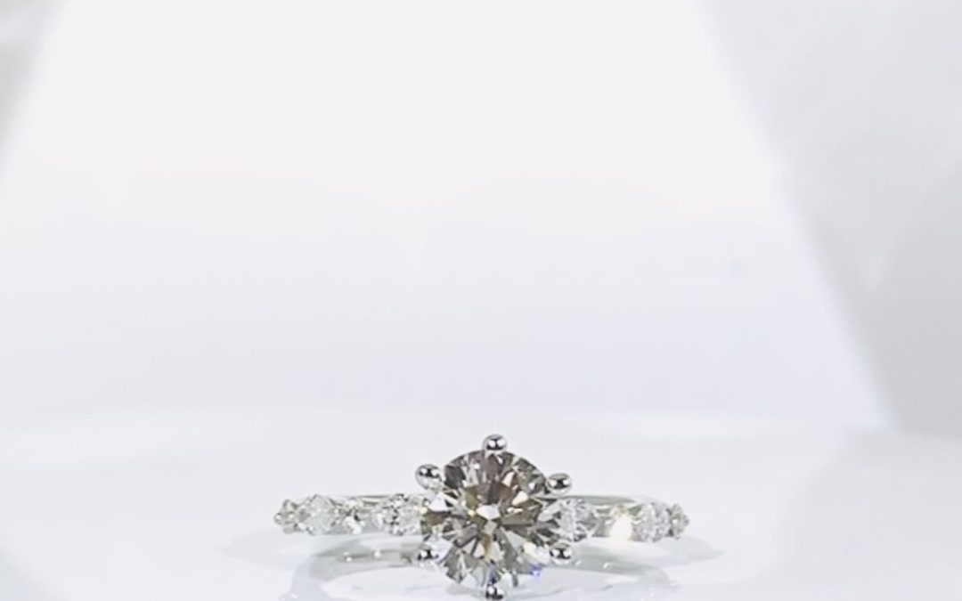 The Timeless Beauty of a Bespoke Diamond Engagement Ring: Unveiling the Perfect Design and Gold Setting